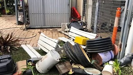 Local community clean up flood damage to men's shed
