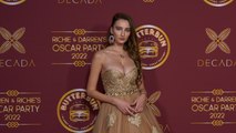 Polly Khotch attends Darren Dzienciol and Richie Akiva’s Oscar Party 2022 red carpet event