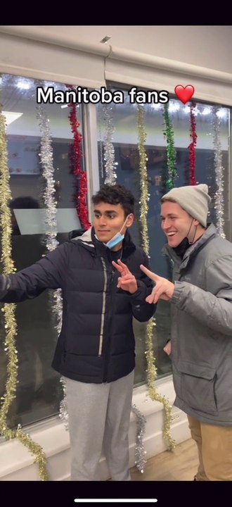 DJ Blitz taking pictures with fans in Winnipeg, MB