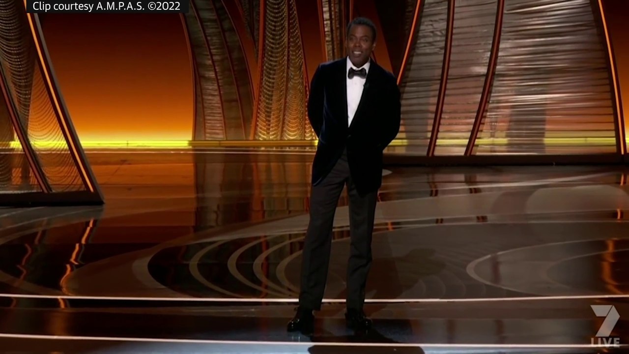 Watch the uncensored moment Will Smith smacks Chris Rock on stage at the Oscars, drops F-bomb