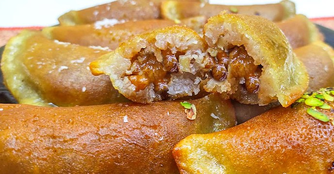 طريقة عمل القطايف بحشوة الجوز