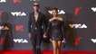 Kourtney Kardashian Slays In Tight Black Strapless Dress With Travis Barker At The Oscars