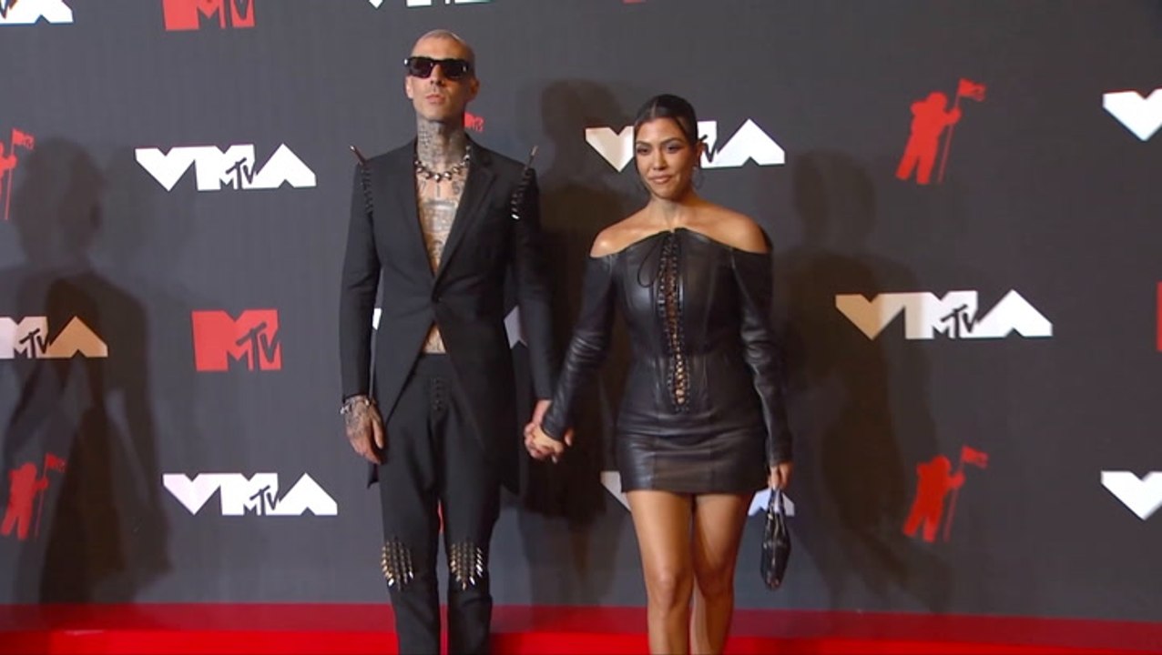 Kourtney Kardashian Slays In Tight Black Strapless Dress With Travis Barker At The Oscars