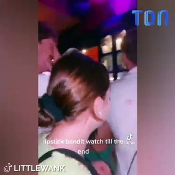 Woman Slammed For Kissing Unsuspecting Men's Shirts In Bar