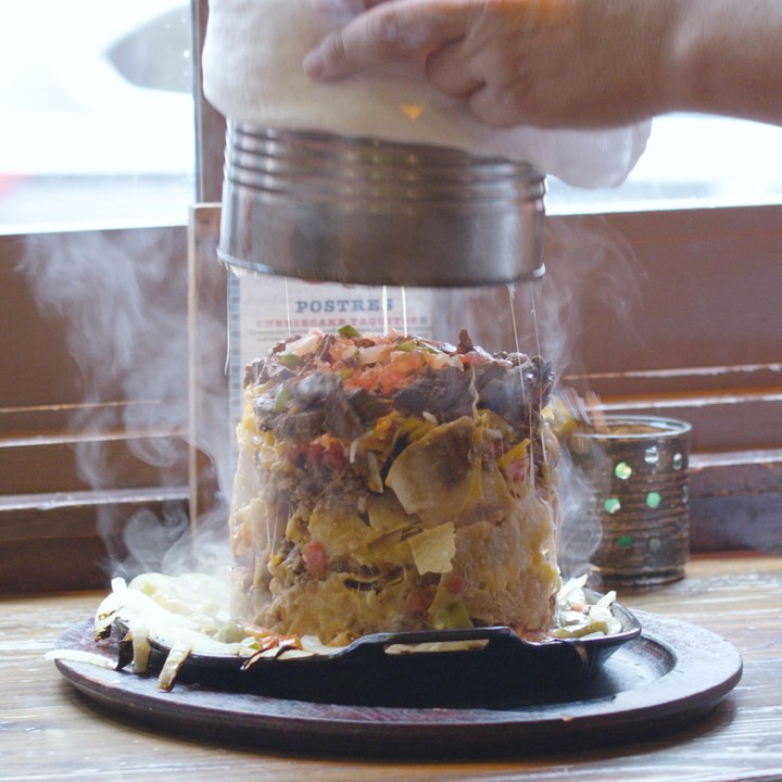 These Nachos Are Dumped on a Sizzling Skillet