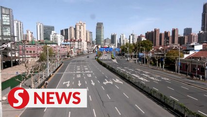 Shanghai expands Covid lockdown