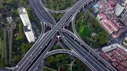 Drone footage shows subdued Shanghai streets as lockdown widens in China's financial hub