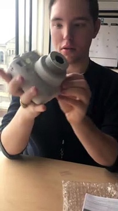 Guy Trying to Turn on Camera Surprised by Unexpected Flash