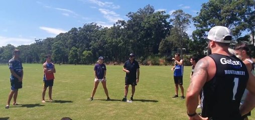 Coach chats to Eagles players