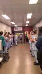 John Hunter Hospital staff applaud Ron Mansfield for beating COVID-19 after Ruby Princess cruise