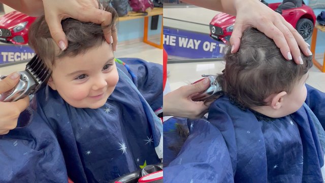 'Adorable boy JUST CAN'T STOP SMILING while getting a haircut '