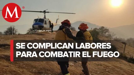 Por fuertes vientos se extiende incendio en la Sierra de Santiago: desalojan a familias