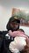 Tayc pose avec un bébé dans les bras sur Instagram