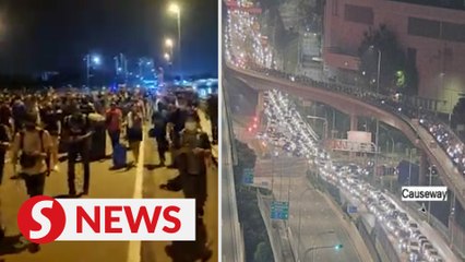 Sheer delight, relief as border reopens at Johor Causeway, Linkedua