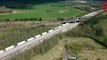 Drone video shows huge truck queues on road to Dover amidst shortage of ferries