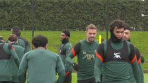 Liverpool players celebrate Harvey Elliott's ahead of training