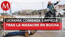 En Ucrania rescatistas recolectan y retiran armas de las calles de Bucha