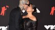 'They just had their team, security and three people that had iPhones: Kourtney Kardashian and Travis Barker 'only had five wedding guests'