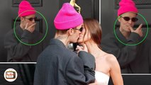 Fans are clap with the moment Justin Bieber wipes his lips after kissing Hailey in Grammy