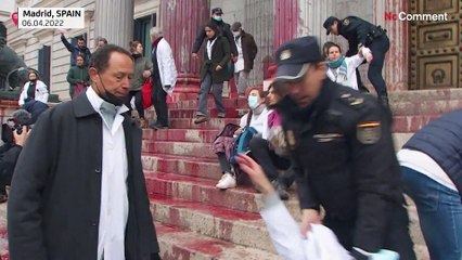 Climate activists paint Spanish parliament the colour of blood