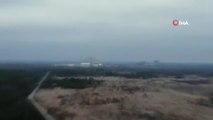 Son dakika! Rus ordusunun Çernobil'de kazdığı siperler görüntülendiRus askerlerinin radyasyona bağlı rahatsızlık geçirebileceği öne sürüldü