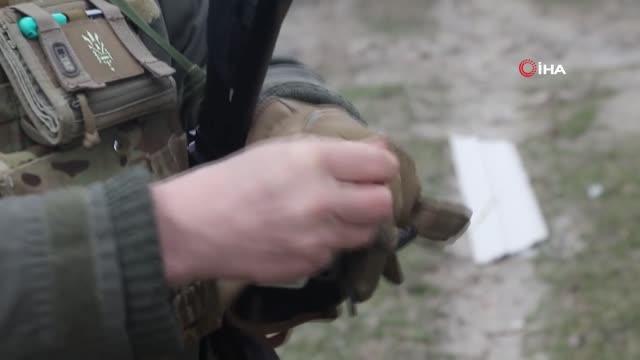 Rus askerlerinden temizlenen bölgelerdeki cansız bedenler toplanıyor