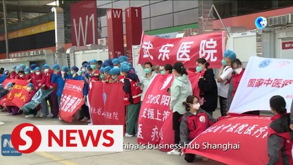 Medics rush to Shanghai to aid Covid-19 battle