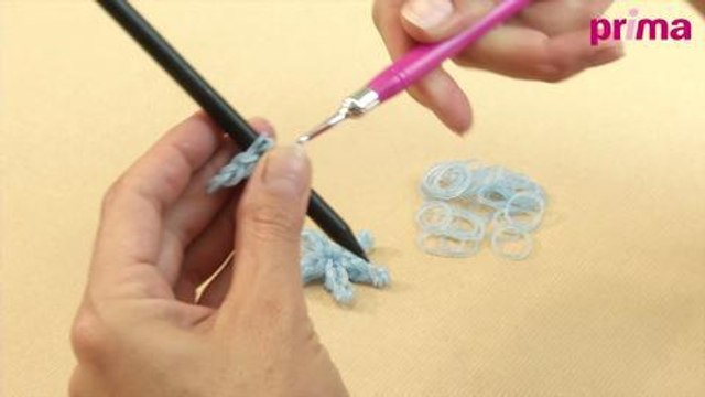 Une étoile de Noël en élastiques Rainbow Loom