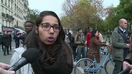 A Paris, devant le Bataclan, l'horreur et les yeux rougis