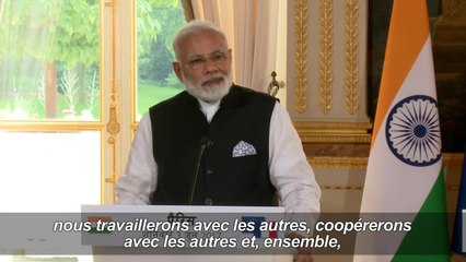 Reçu par Macron, Modi dit soutenir l'Accord de Paris