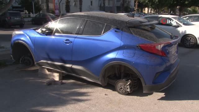 Lüks aracın 4 lastiğini çalıp, kaldırım taşı üzerinde bıraktılar