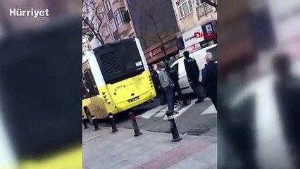 Kartal'da yol ortasına park ettiği aracıyla İETT otobüsü arasında sıkıştı