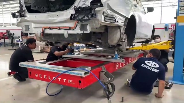 Mercedes-Benz E Class rear accident repair on Celette Sevenne bench with dedicated fixtures