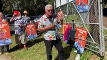 Protestors perform 'April Sun in Cuba' at Prime Minister's Gilmore doorstop, Culburra Beach