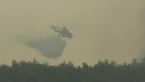 경북 군위군 산불 이틀째...헬기 대거 투입 / YTN