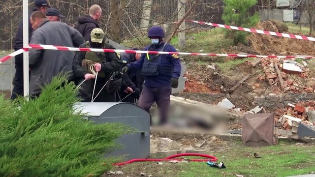 Ukrainian authorities uncover at least two civilian bodies in Kyiv town after Russian withdrawal