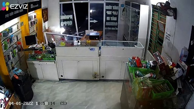 Motorcyclist Loses Control and Crashes into Store Window