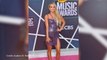 Carrie Underwood Channels Pink With Acrobatic Moves At CMT Awards