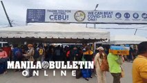 Vacationers line up in Port of Cebu Pier 1 for the Holy Week