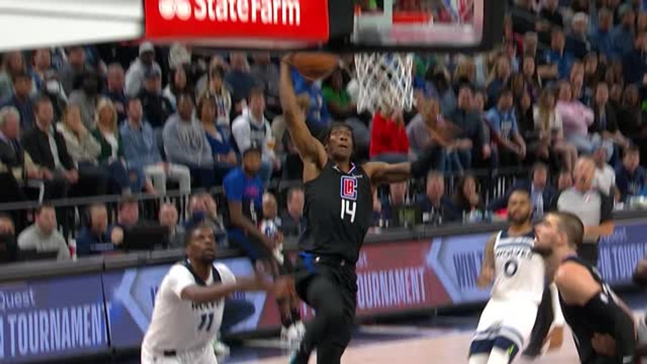 Mann with a big block before an even bigger dunk