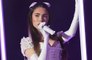 Madison Beer's wows in white corset on stage during Life Support tour in London