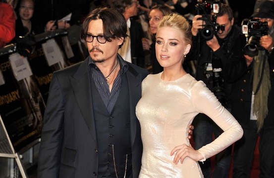 Johnny Depp denies sexually assaulting ex-wife Amber Heard with a bottle