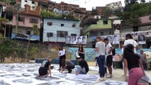 Venezuela: 600 portraits pour valoriser un quartier à la réputation violente