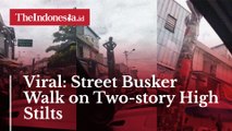 Viral: Street Busker Walk on Two-story High Stilts