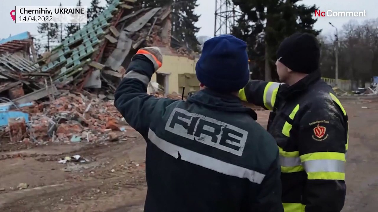 Rescuers clear rubble from damaged houses in Chernihiv