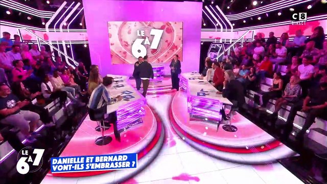 Danielle Moreau et Bernard Montiel échangent un bisou dans Touche pas à mon poste
