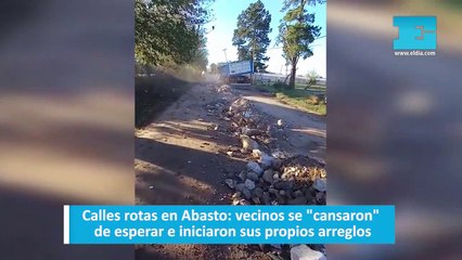 Calles rotas en Abasto: vecinos se "cansaron" de esperar e iniciaron sus propios arreglos