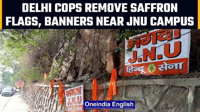 Delhi: Cops remove saffron flags, banners put up by Hindu Sena near JNU campus | OneIndia News