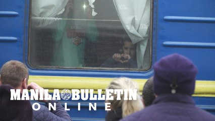 Heartfelt goodbyes as evacuation train leaves Ukraine's Zaporizhzhia