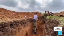 In Rubizhne, Ukrainian soldiers dig trenches, brace for Russian assault